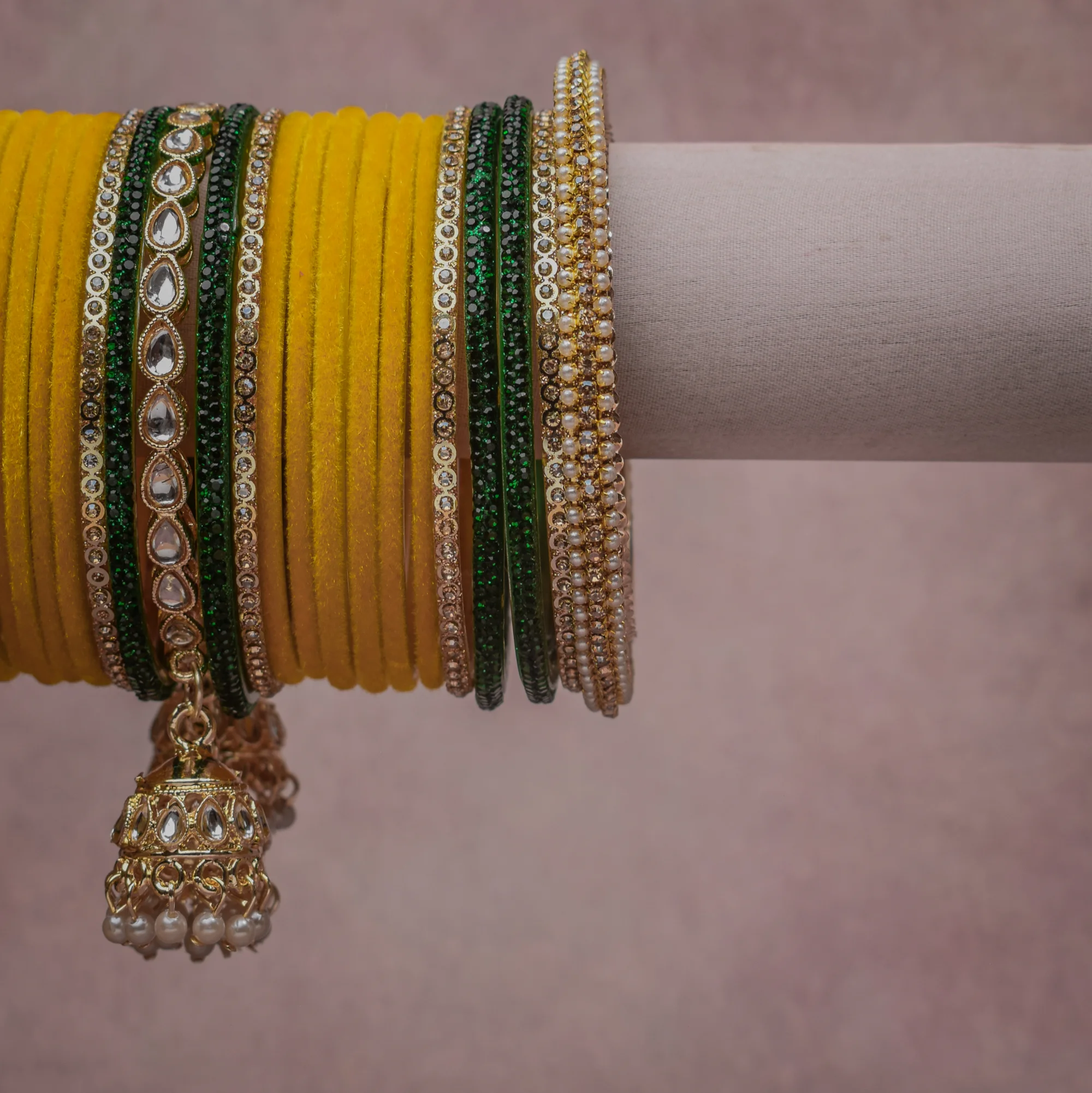 A majestic Saffron Yellow set, complemented by Clear Crystal, Cream Pearl, Champagne Gold, Metallic Gold, Ivory, Clear featuring Velvet, Glass, Gold-toned Metal, Pearls, Kundan Stones, Crystals.
Rich, ceremonial, and designed to be passed through generations.